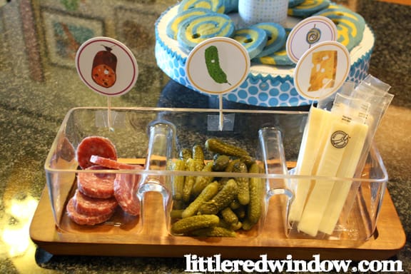 Snack tray with One slice of cheese sticks , Pickles &  Salami