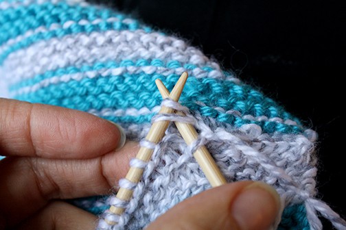 photo showing how to k2tog with the picked up stitch and the first existing stitch that was already on your left needle