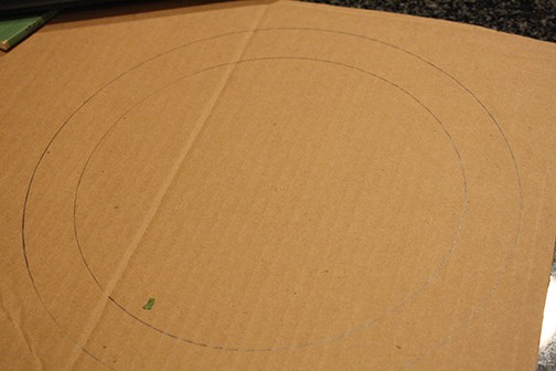 cut out cardboard circle for a wreath base