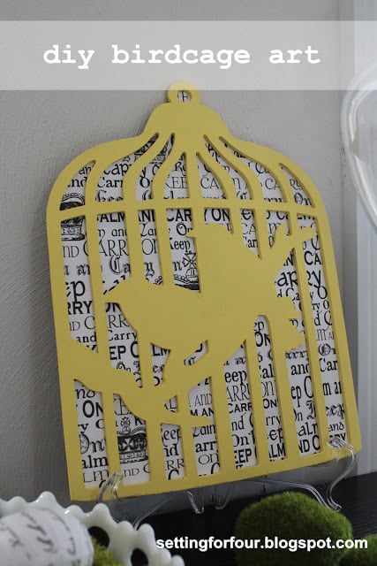 wood birdcage shaped art with paper backing
