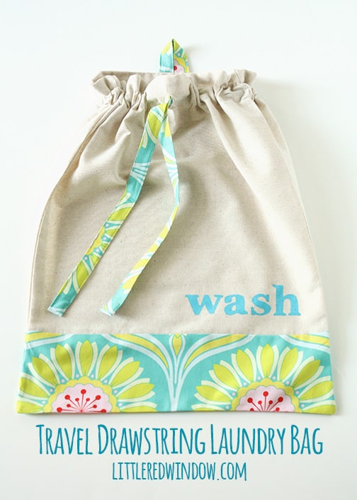 Travel Drawstring Laundry Bag Tutorial | littleredwindow.com | Make a pretty and useful travel laundry bag with cute stenciled detail with this great tutorial!