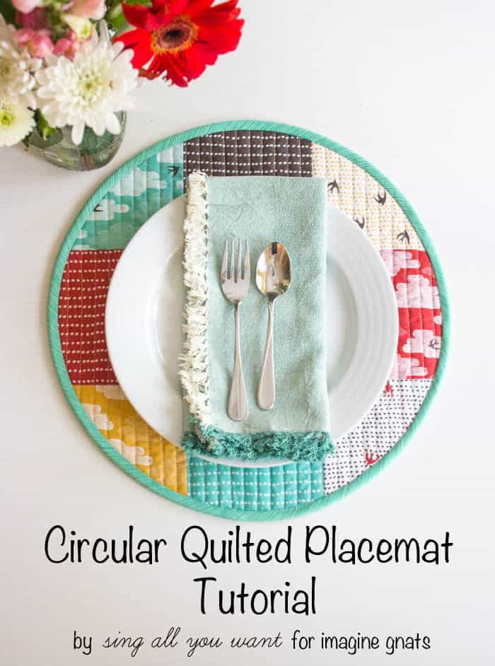 Circular quilted placemat with a white plate on top and mint napkin and silverware