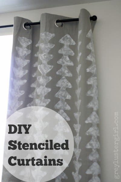 Gray curtain with white triangles printed on it