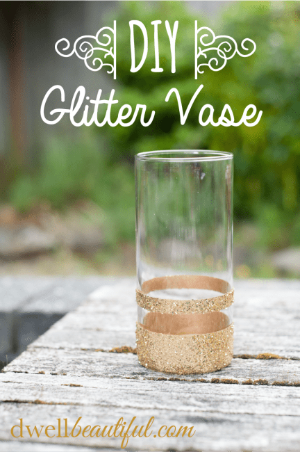 clear cylinder vase with stripes of gold glitter applied