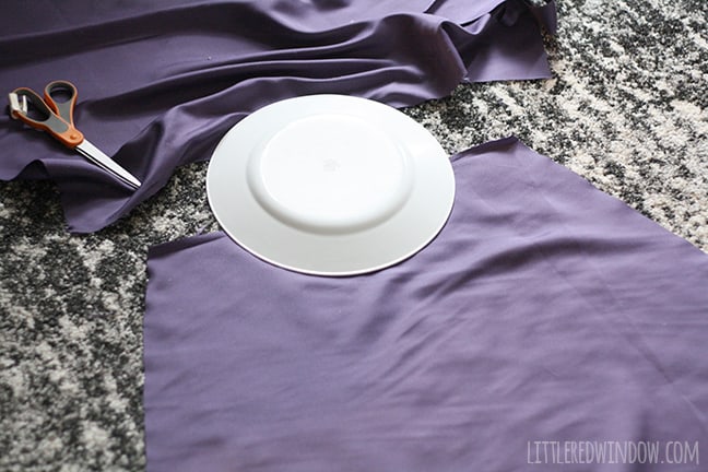 purple fabric with neck shape cut out