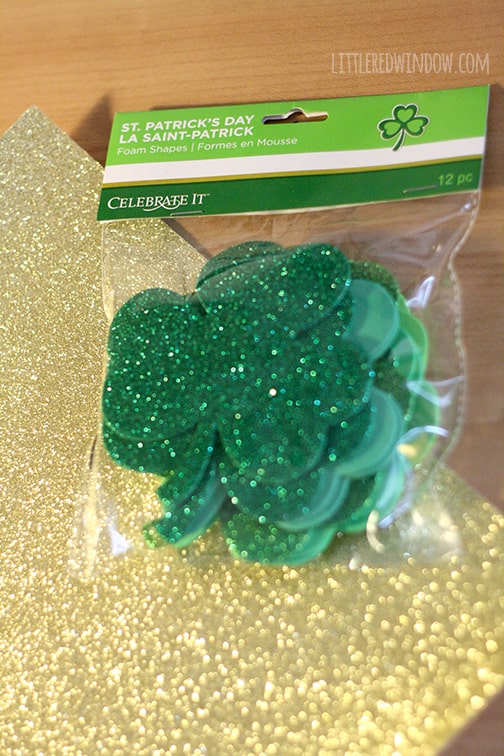 package of green glitter shamrock shapes