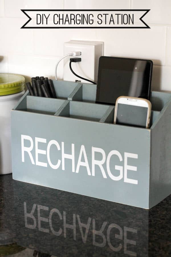 Gray wood charing station with the word RECHARGE on the front