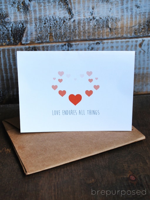 card with hearts that says LOVE ENDURES ALL THINGS