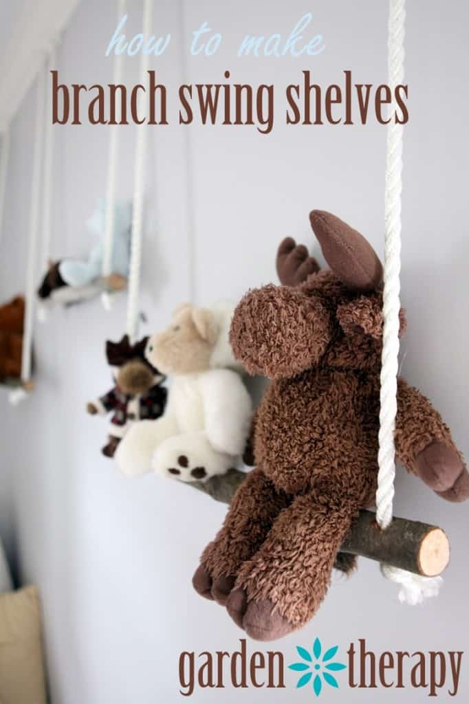 branch hanging from rope used as a swing to hold stuffies