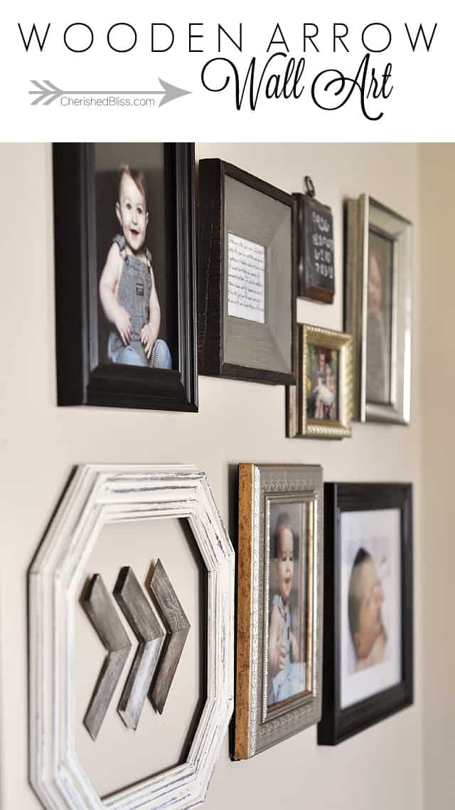 gallergy wall with arrow shaped art among photos