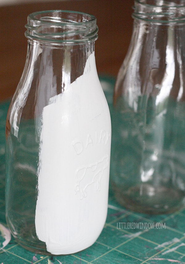 How to Chalk Paint Glass Milk Bottles | littleredwindow.com | It's so easy to use chalk paint to transform these cute little 89 cent milk bottles!