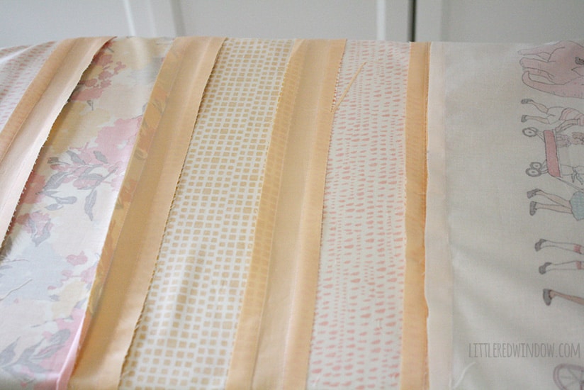 Simple Strip Crib Quilt| littleredwindow.com | This simple crib quilt is so much easier to make than it looks! 