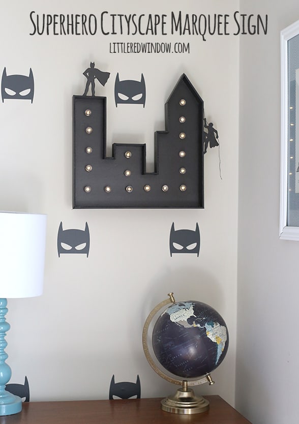 Make your own light up Superhero Cityscape Marquee Sign, your favorite superhero fan will love it! | littleredwindow.com