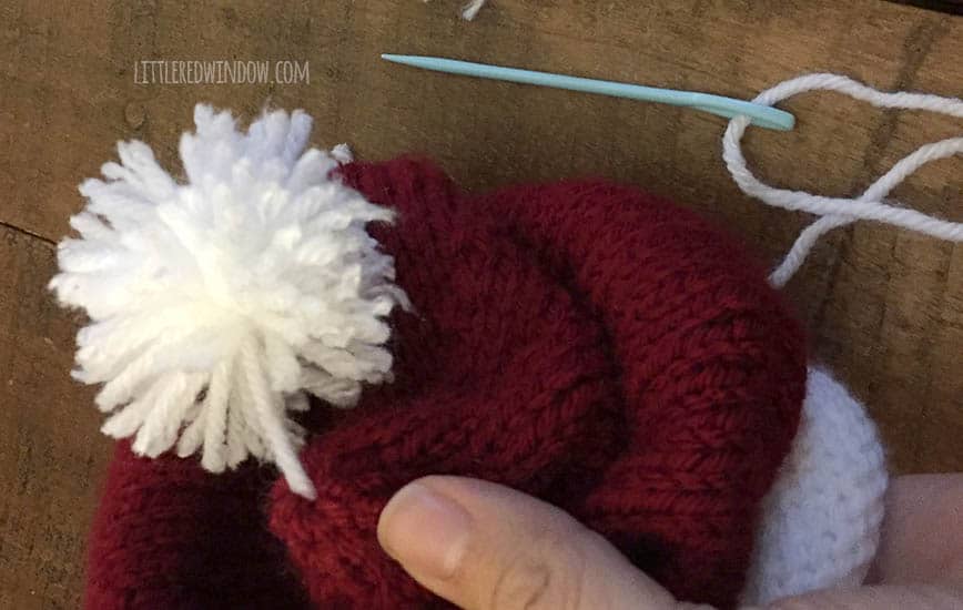 Little Santa Hat Knitting Pattern, a simple pattern for your little one for the holidays! | littleredwindow.com