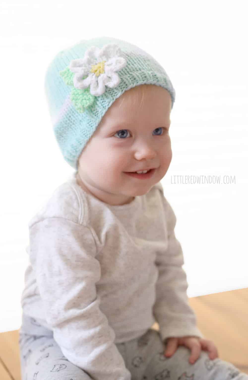 Spring Daisy Hat Knitting Pattern for newborns, babies and toddlers! | littleredwindow.com