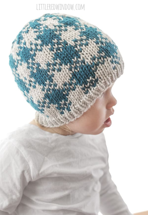 Easy Plaid Hat Knitting Pattern for newborns, babies and toddlers, this is a fun quick knit with and easy plaid pattern that only uses two colors of yarn! | littleredwindow.com