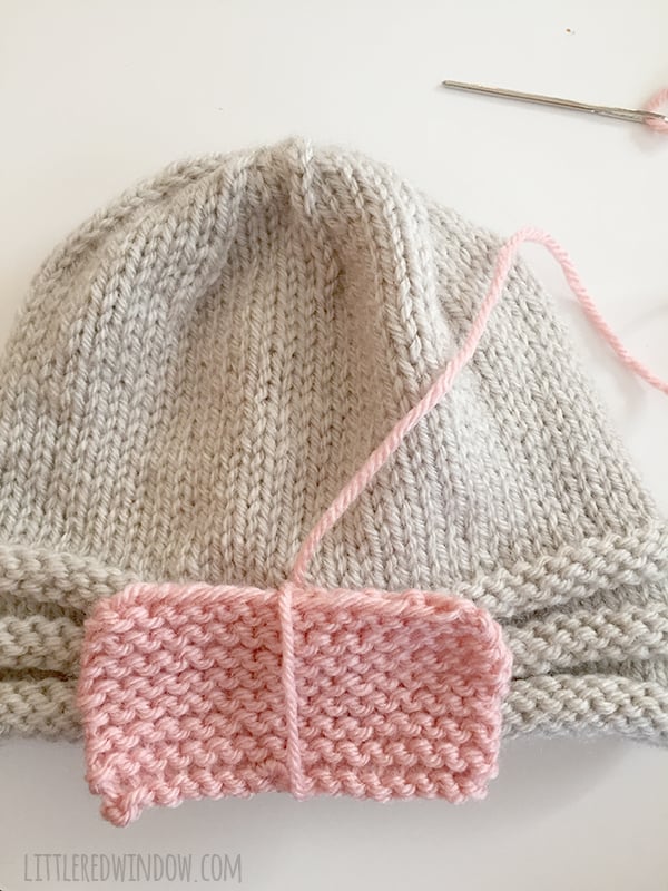 Gathered Bow Hat Knitting Pattern for newborns, babies and toddlers! | littleredwindow.com
