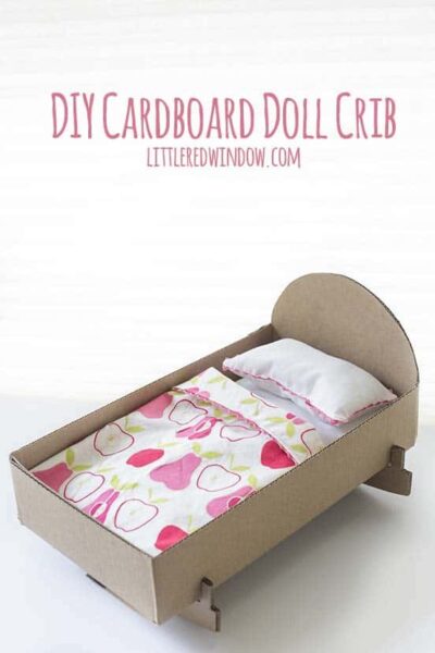 DIY Doll Crib from a cardboard box! This quick and easy craft will be a hit with your little one!