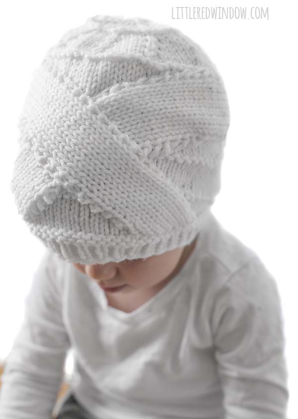 Halloween Mummy Hat Knitting Pattern, this cute hat makes for an easy DIY Halloween costume, just add a white onesie!