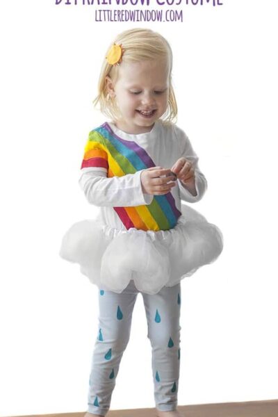 DIY Rainbow Costume for Kids! Get instructions to make this adorable costume including rainbow shirt, cloud tutu, raindrop leggins and sun hair clip!