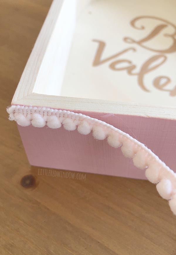Attach tiny pom pom trim to the edge of a heart shaped tray for Valentine's Day!