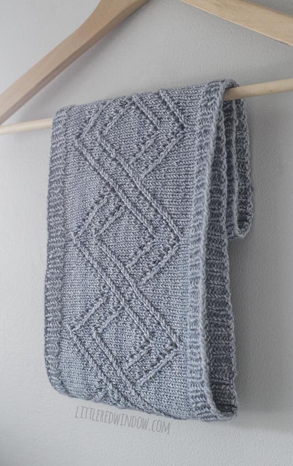 The Mary Lace Cable Cowl is an easy knit with a beautiful pattern of intertwined lace bands around the middle!