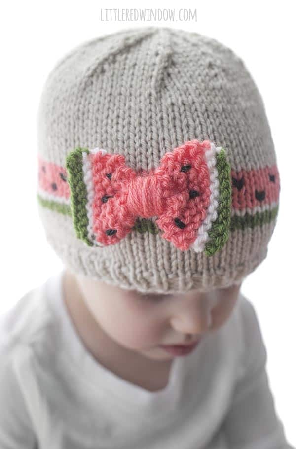 The best part of the Watermelon Bow Hat knitting pattern is that the two sides of the bow look like nice juicy slices of watermelon!