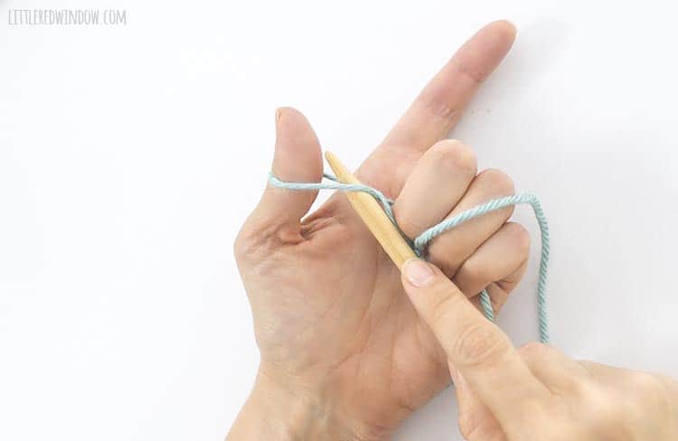 For a backward loop cast on, put the knitting needle through the loop around your thumb