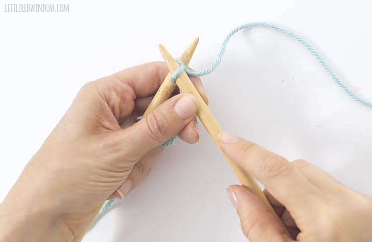 To do a knitted cast on, pull the working yarn through just like a knit stitch