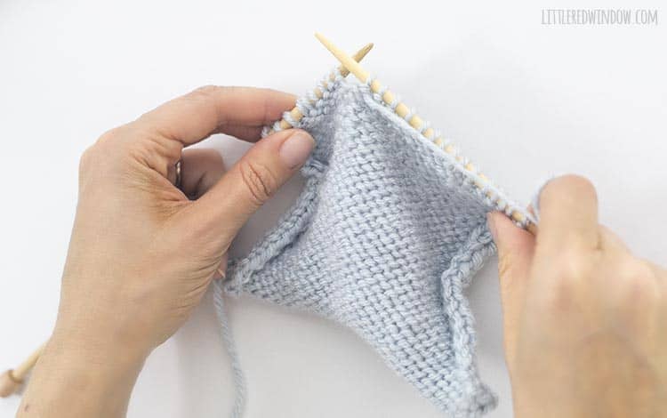 Hold the yarn in front of your work to knit a purl stitch