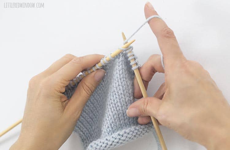 Loop the yarn around the right needle to form your knit stitch