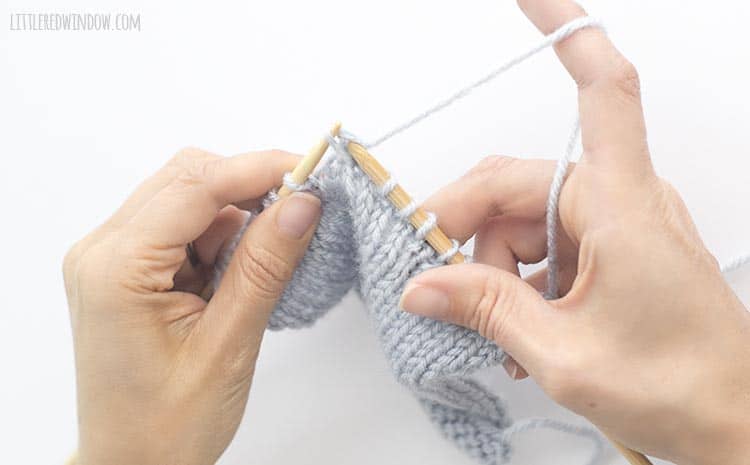 To complete the sk2p stitch, use the tip of the left knitting needle to lift the slipped stitch over the k2tog and off the right knitting needle
