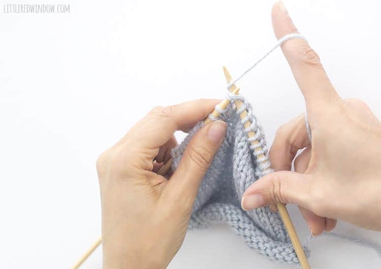 To k2tog, wrap the yarn around the tip of the right knitting needle