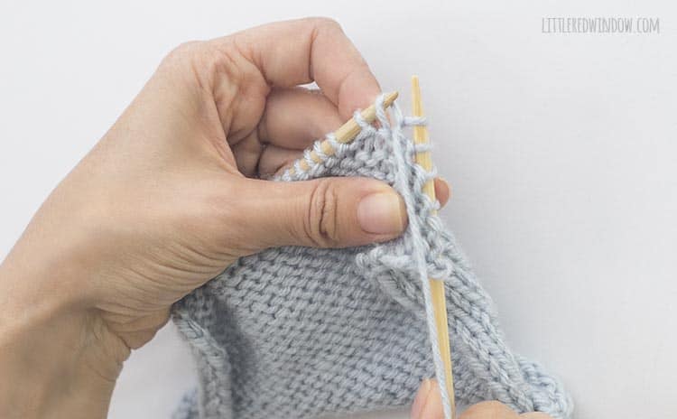 To finish a ptbl stitch, pull the yarn through the original stitch and drop the stitch from the left knitting needle