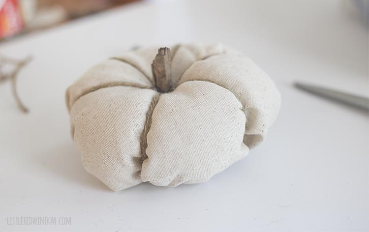 Use a twig for the stem of your fabric pumpkin