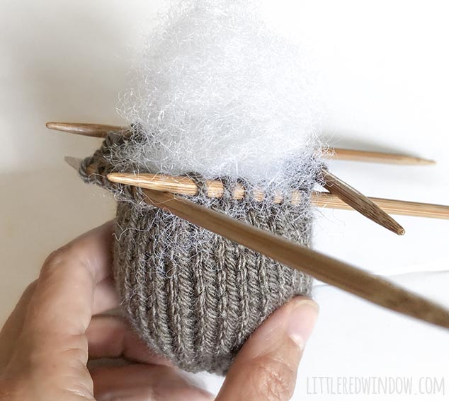Stuff the knit pumpkin with polyfill stuffing before you finish knitting it!