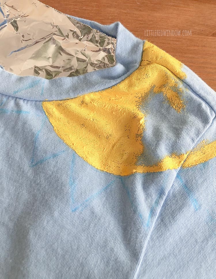 Fill in the sun on your butterfly garden costume tshirt with yellow fabric paint!