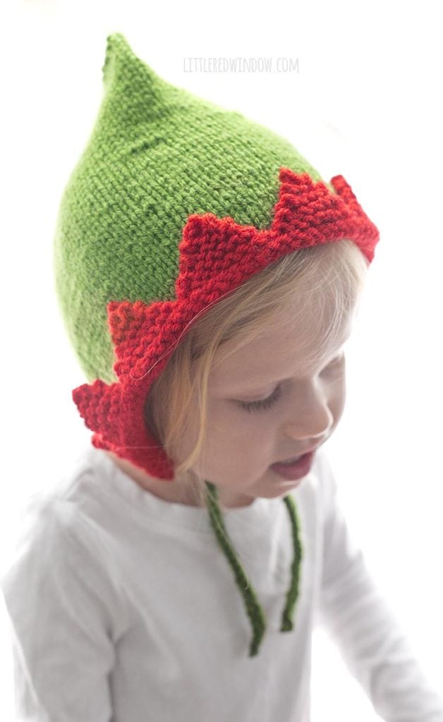 The Elf Pixie Bonnet knitting pattern is the perfect Christmas pattern, it even has chin ties to keep it on your little one!
