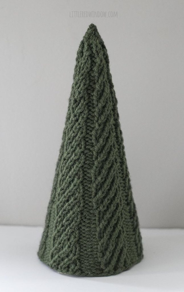 The large Cozy Christmas tree knitting pattern features a super easy twisted rib pattern!