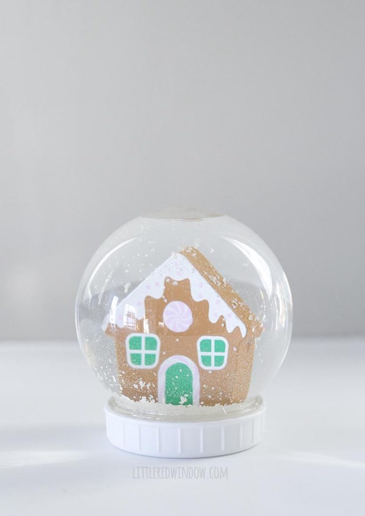 Cute DIY snowman with a gingerbread house inside!