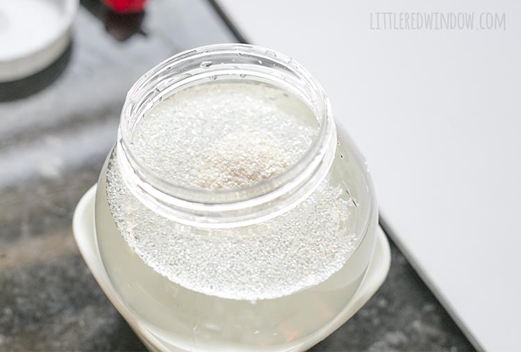 Fill your DIY snowglobe with glitter and water!