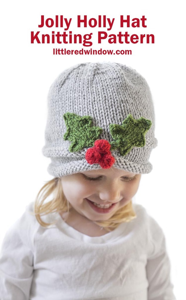 The Jolly Holly Hat knitting pattern is the perfect Christmas baby hat pattern with its sweet gathered brim and cheerful Holly berries!