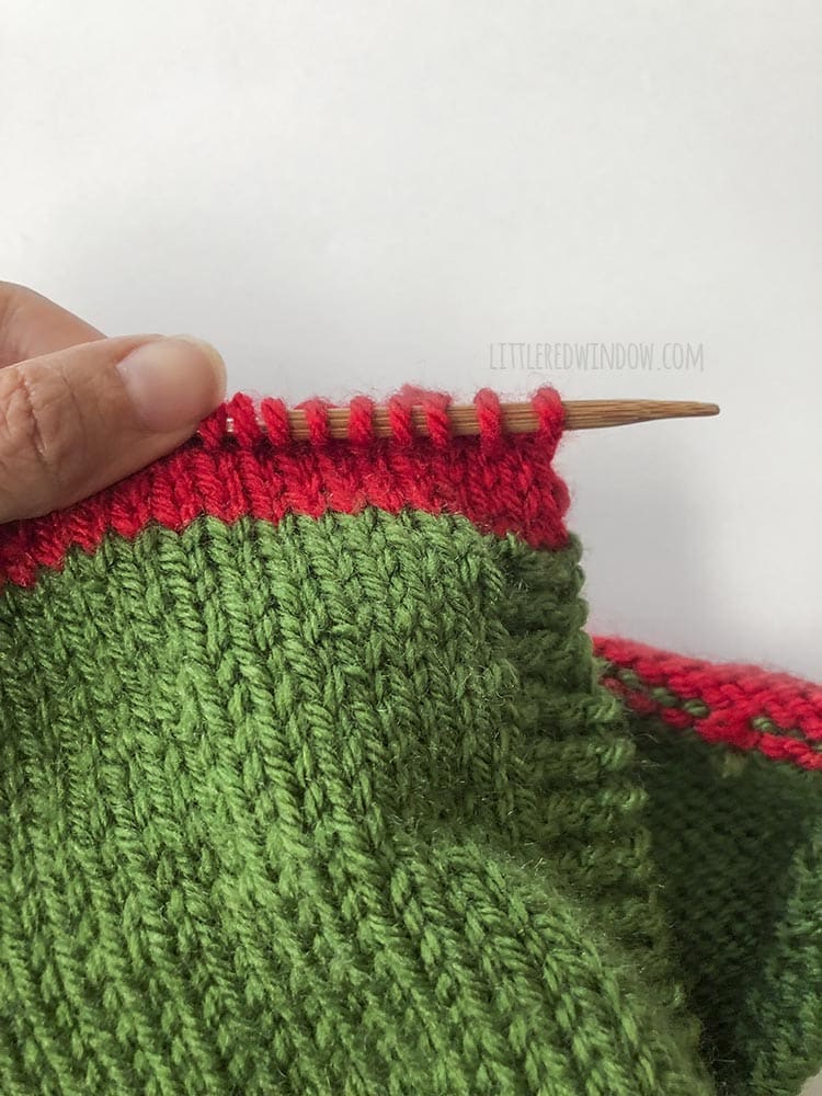 Pick up stitches along the cast on edge to knit the pointed brim of the Elf Pixie Bonnet Knitting Pattern!