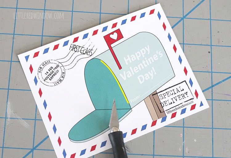 Cut an opening in the mailbox valentine with your craft knife!