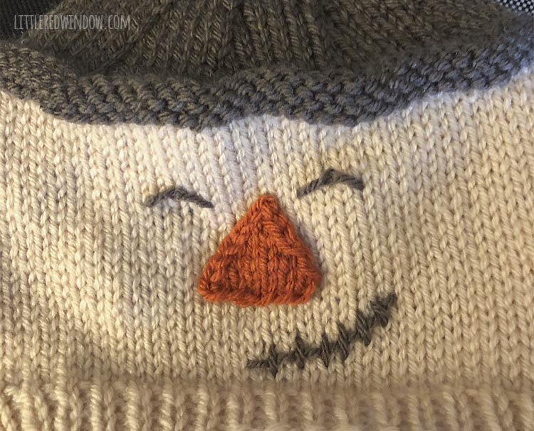 closeup of finished scarecrow face on baby hat