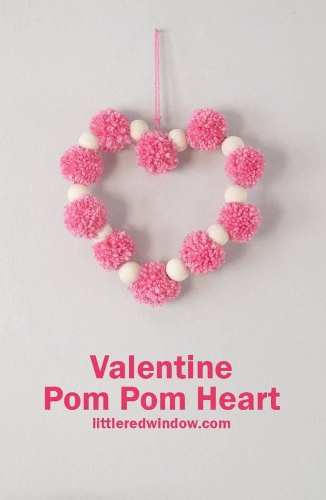 The adorable Valentine Pom Pom heart craft is a quick and fun project to make for your home this Valentine's Day!