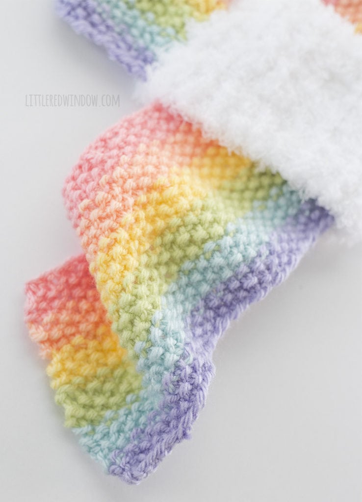 closeup of seed stitch texture on rainbow scarf knitting pattern