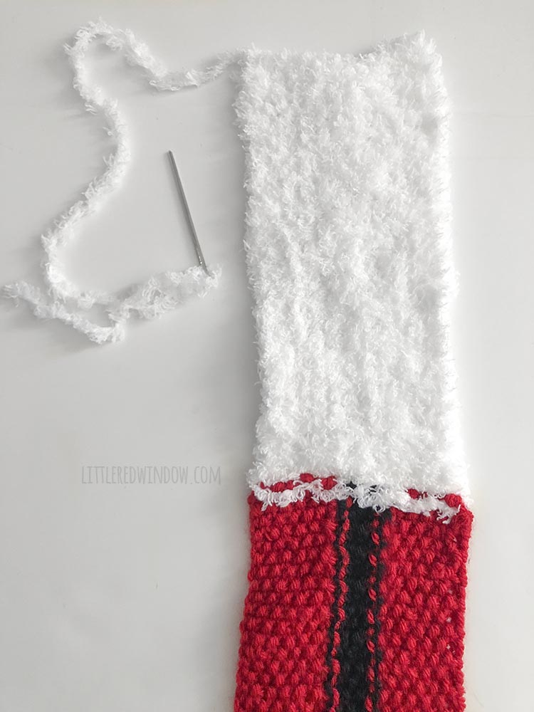 christmas scarf with fluffy white loop rows knit before assembly