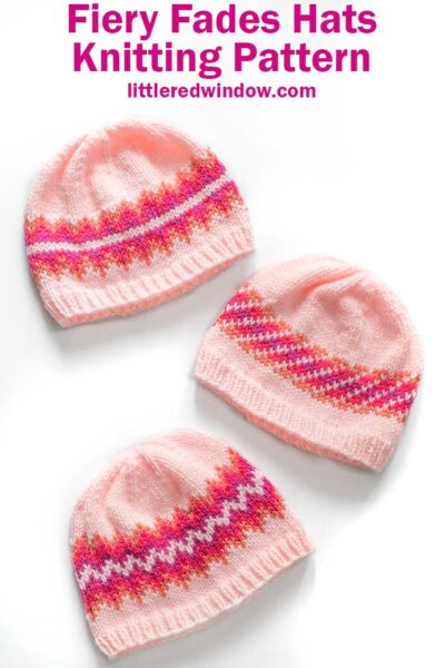 three pink orange magenta and purple knit hats with different sunset fade patterns