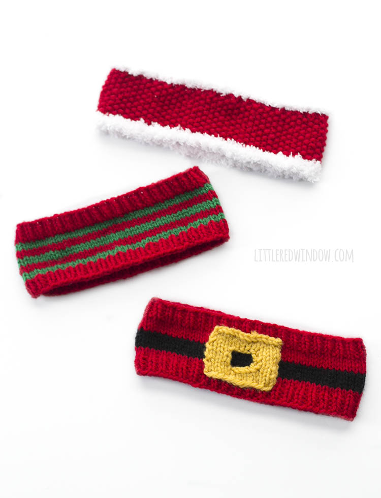 three knit christmas headbands in red white and green laying angled on a white background